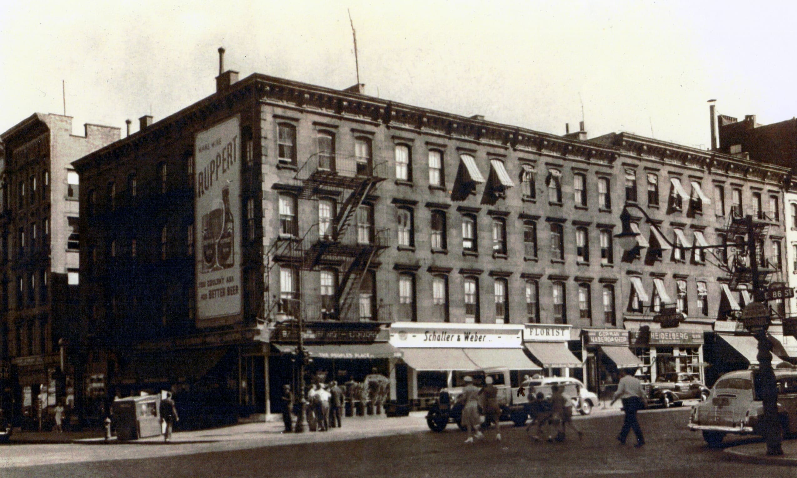 Schaller & Weber storefront and street in 1941