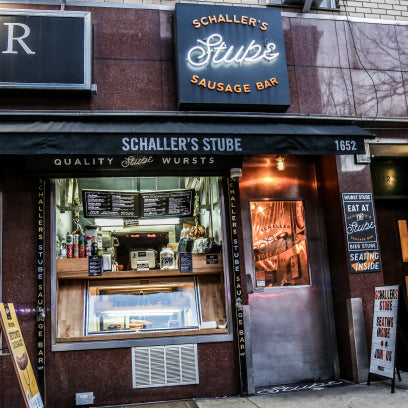 Window cashier of Schaller's Stube, causal German eatery in New York City