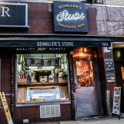 Window cashier of Schaller's Stube, causal German eatery in New York City